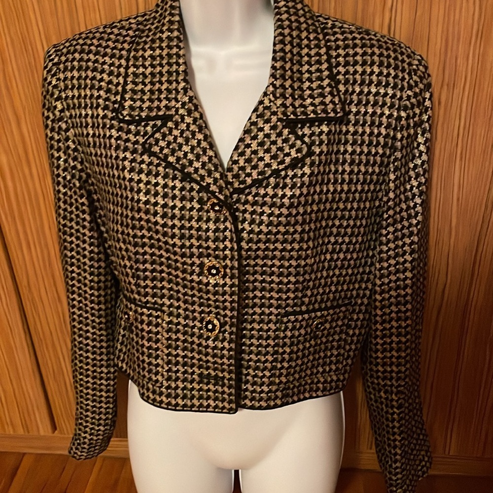 Women short jacket not new good condition color black with gold thread size 12